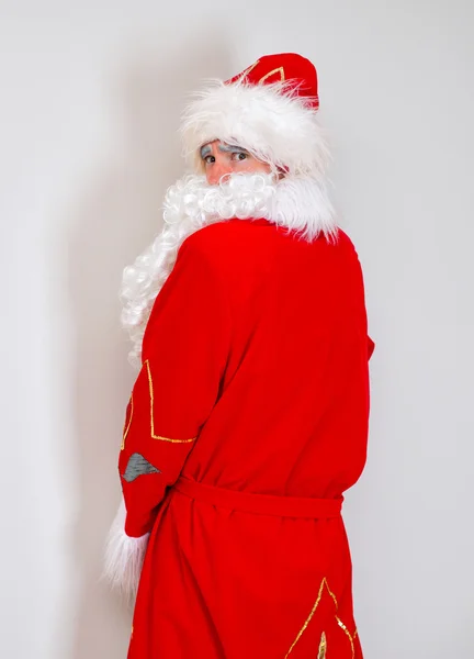 Drunk Santa Claus pee on the wall. — Stock Photo, Image