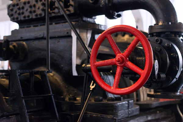 Red valve. Part of old power plant. — Stock Photo, Image
