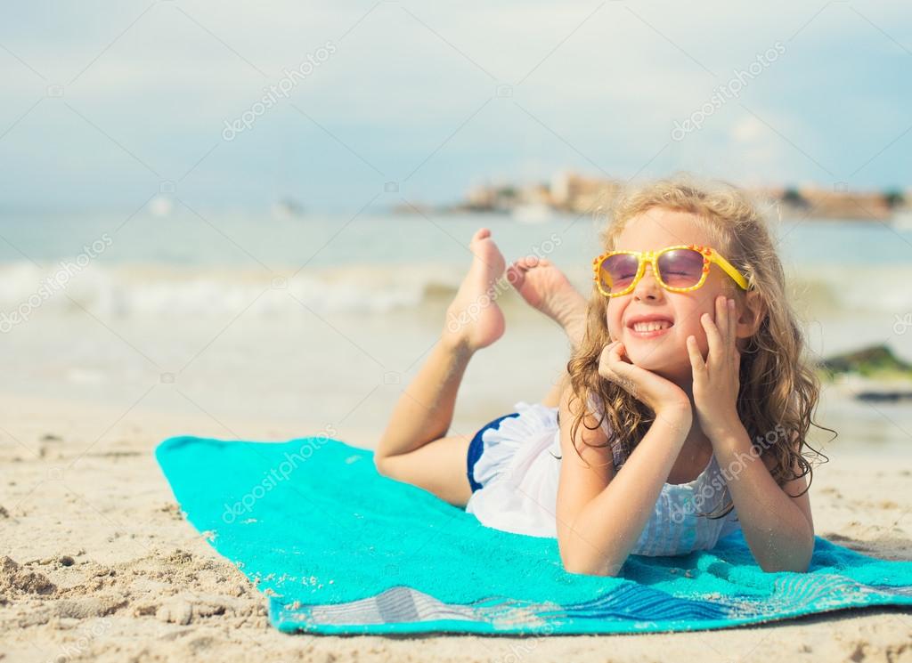 Little Girl Sunbathing Near Pool Stock Image - Image of 