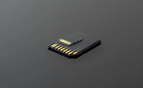 SD and Micro SD card on black background.