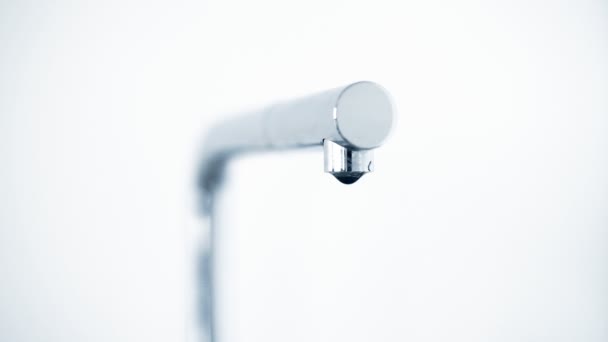 Kitchen faucet with dripping water drops. Blue effect. — Stock Video