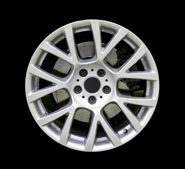 Sports car rim isolated on black background. — Stock Photo, Image