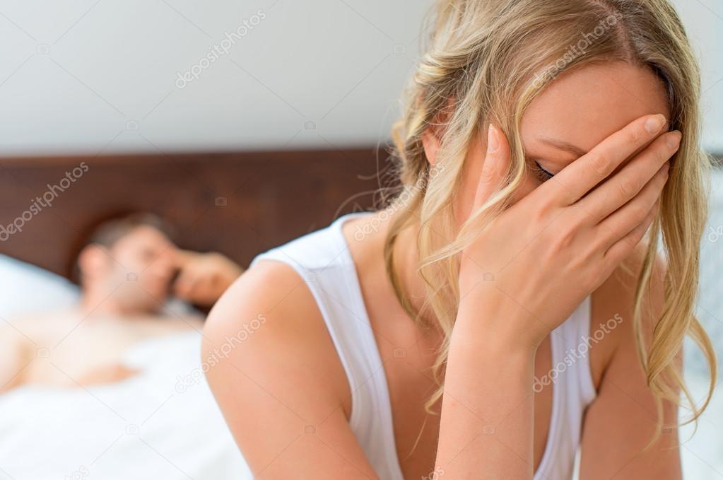 Upset young couple having problems with sex.