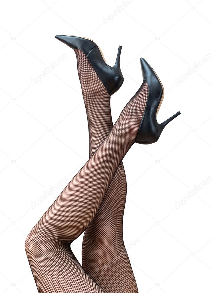 Sexy female legs in black tights and shoes raised up.