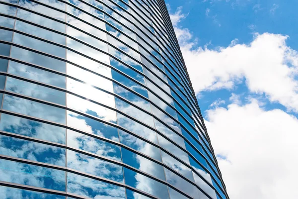 Modern round glass building in the city. — Stock Photo, Image