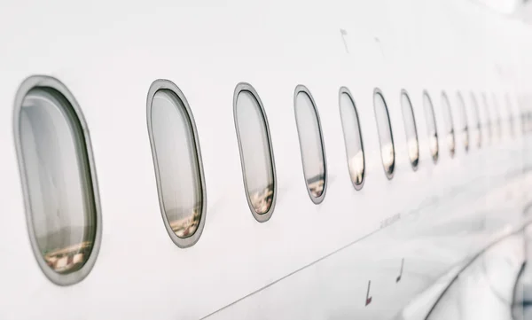 Passenger aircraft windows. View from outside. — Stock Photo, Image