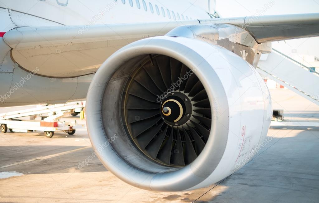 Modern engine of passenger airplane in airport.