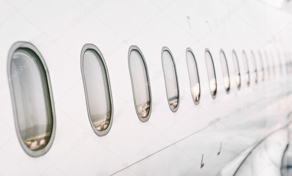 Passenger aircraft windows. View from outside.
