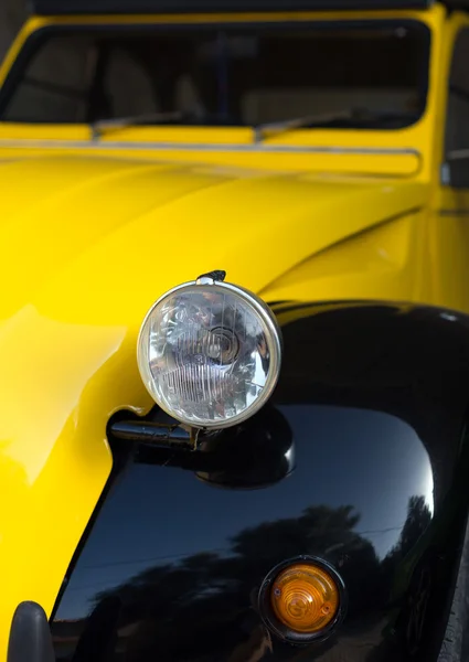 Part of old retro yellow car. — Stock Photo, Image