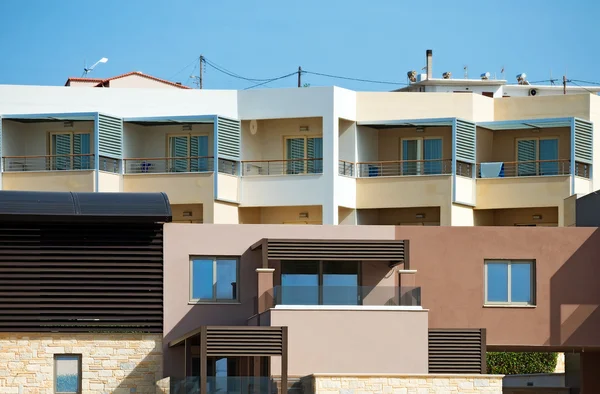 Two tropical apartment buildings with balconies. — Stock Photo, Image