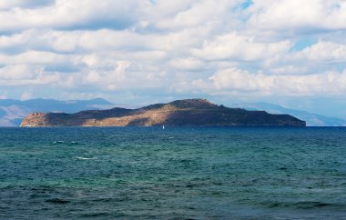 Agioi Theodoroi. Deserted island in the Mediterranean sea. clipart