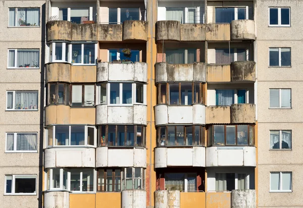 Dirty facade with balconies and windows. — Stock Photo, Image