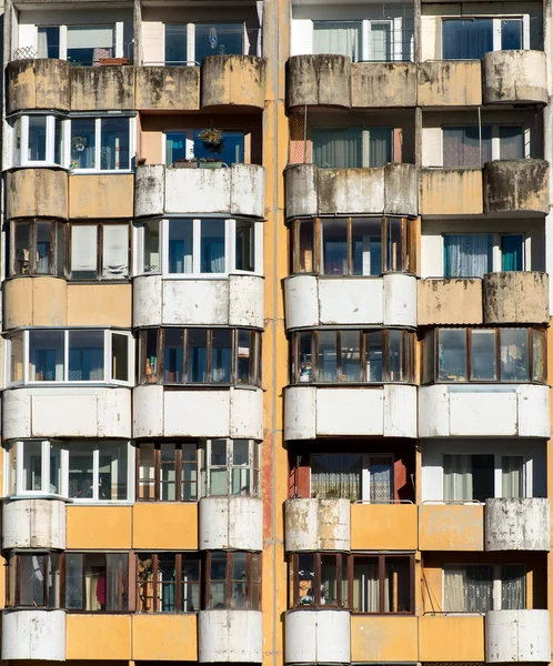 Dirty facade with balconies and windows. — Stock Photo, Image