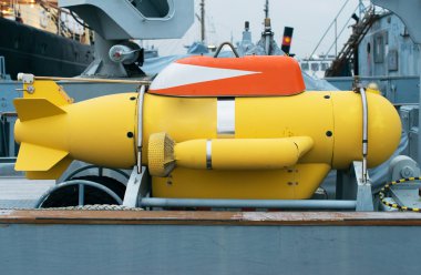 Unmanned underwater vehicle on the ship. clipart