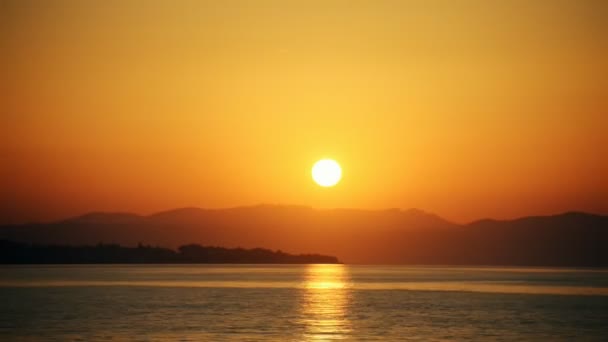 Sunset in the bay over mountains. — Stock Video