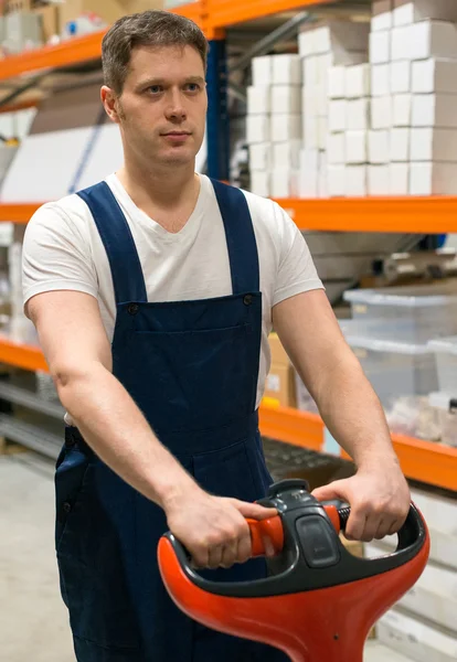 Forklift operator working in the warehouse. — Stock Photo, Image