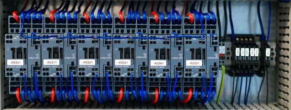 Close-up view of industrial controls at factory.