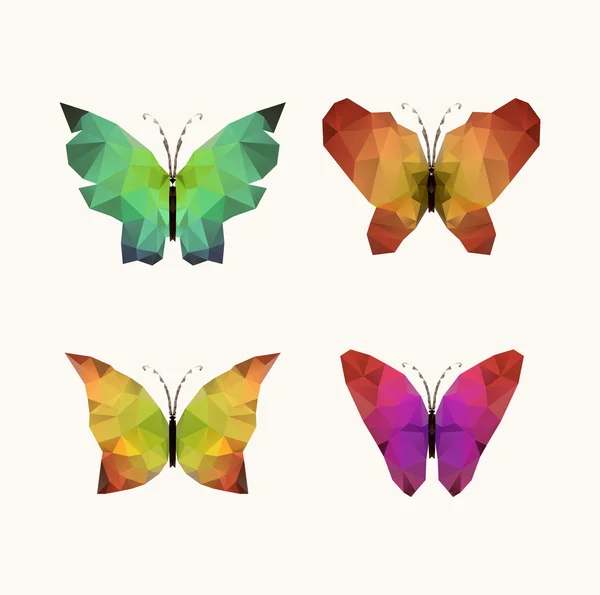 Siluetas poligonales triangulares de mariposa — Vector de stock