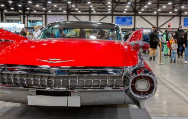 Saint-Petersburg - 10 Nisan 2021: The Vintage lüks Cadillac Coupe DeVille 1959 St. Petersburg uluslararası otomobil fuarında gösterildi. Arka trafik lambalarının ayrıntıları.