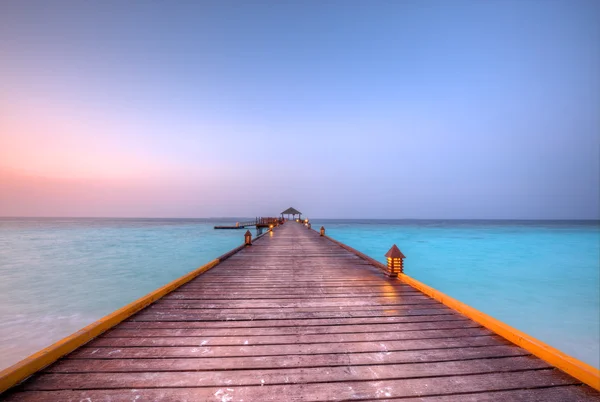 日没で木製の桟橋 — ストック写真