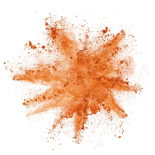 Вибух помаранчевого порошку на білому тлі — стокове фото