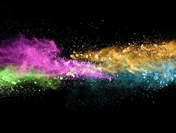 Explosion of colored powder on black background — Stock Photo, Image