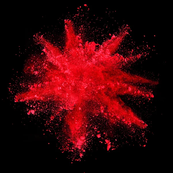 Esplosione di polvere rossa su fondo nero — Foto Stock