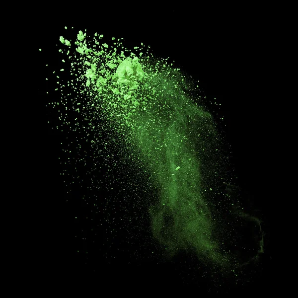 Explosión de polvo verde sobre fondo negro —  Fotos de Stock