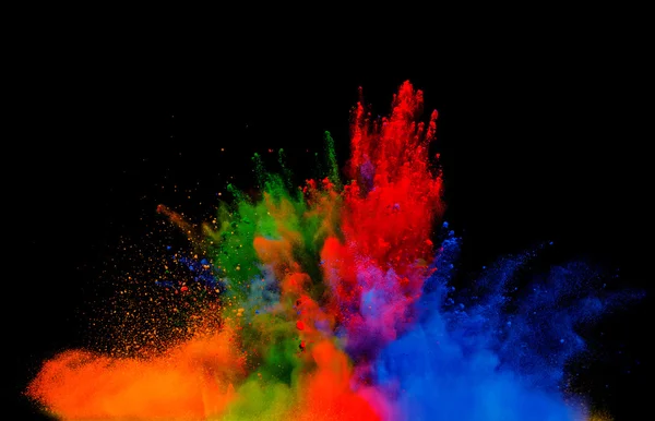 Explosion de poudre colorée sur fond noir — Photo