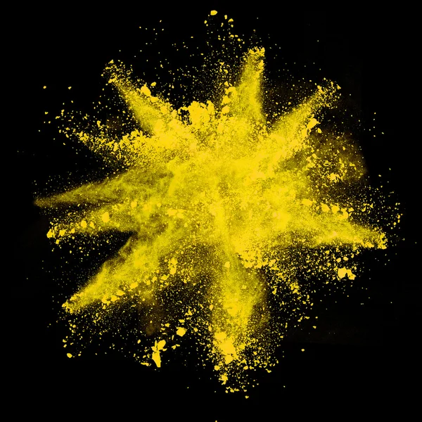 Explosion gelben Pulvers auf schwarzem Hintergrund — Stockfoto