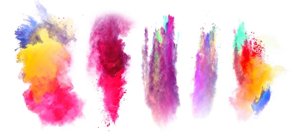 Explosions of colored powder on white background — Stock Photo, Image