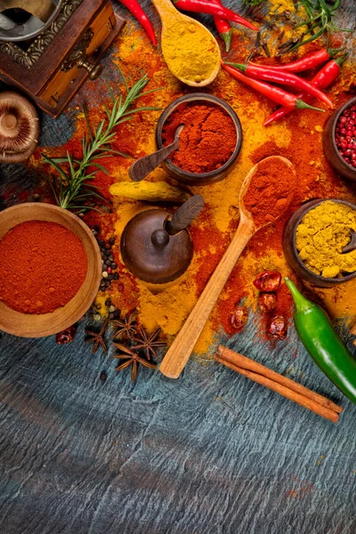 Various spices on black stone — Stock Photo, Image