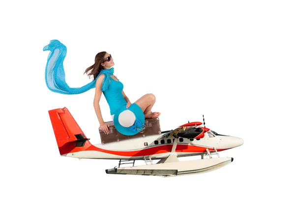 Vrouw zittend op watervliegtuig op witte achtergrond — Stockfoto