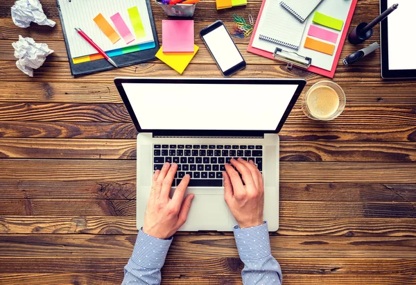 Hands of a man using laptop with empty display — Stock Photo, Image