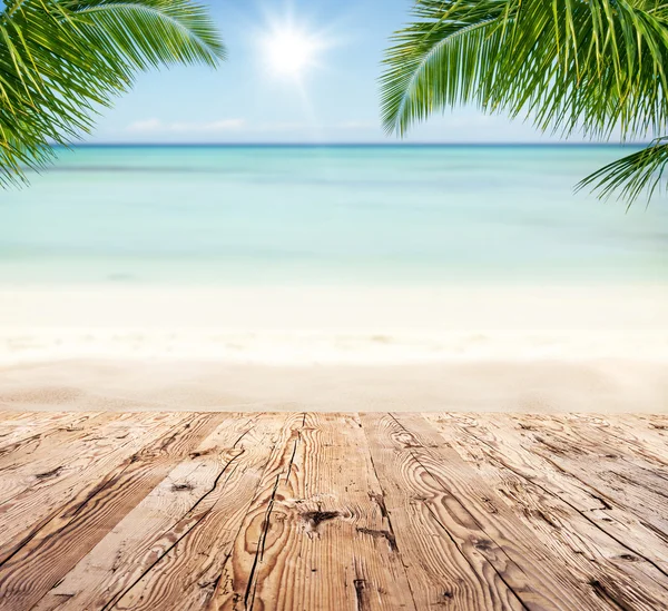 Empty wooden planks with blur beach on background — Stock Photo, Image