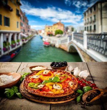Rustic pizza with old city Italy background clipart