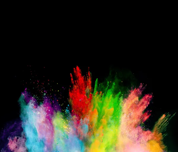 Explosion of colored powder on black background — Stock Photo, Image