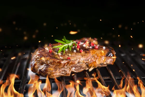 Beef steak on grill — Stock Photo, Image