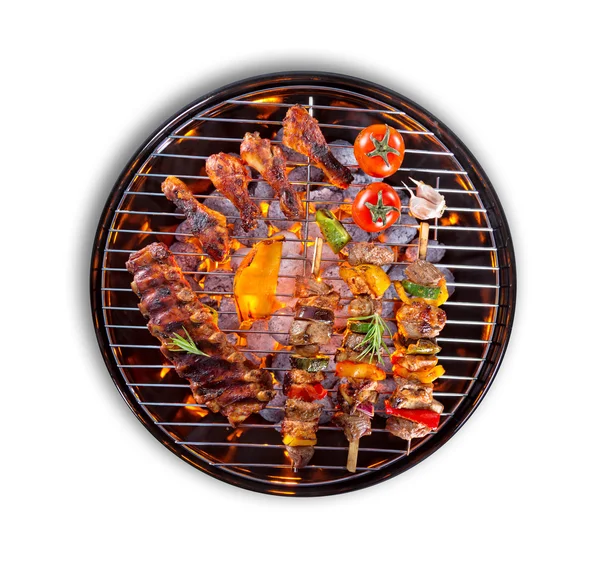 Various kind of meat served on grill — Stock Photo, Image