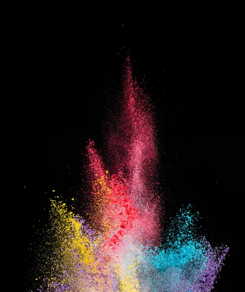 Explosion von farbigem Puder auf schwarzem Hintergrund — Stockfoto