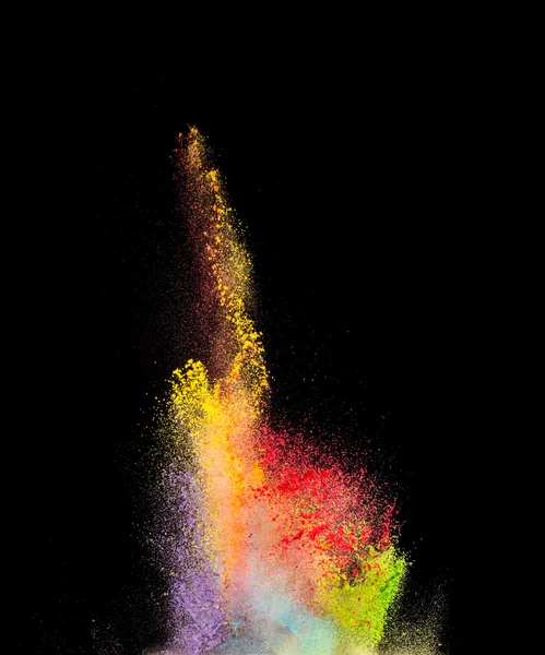 Explosion of colored powder on black background — Stock Photo, Image