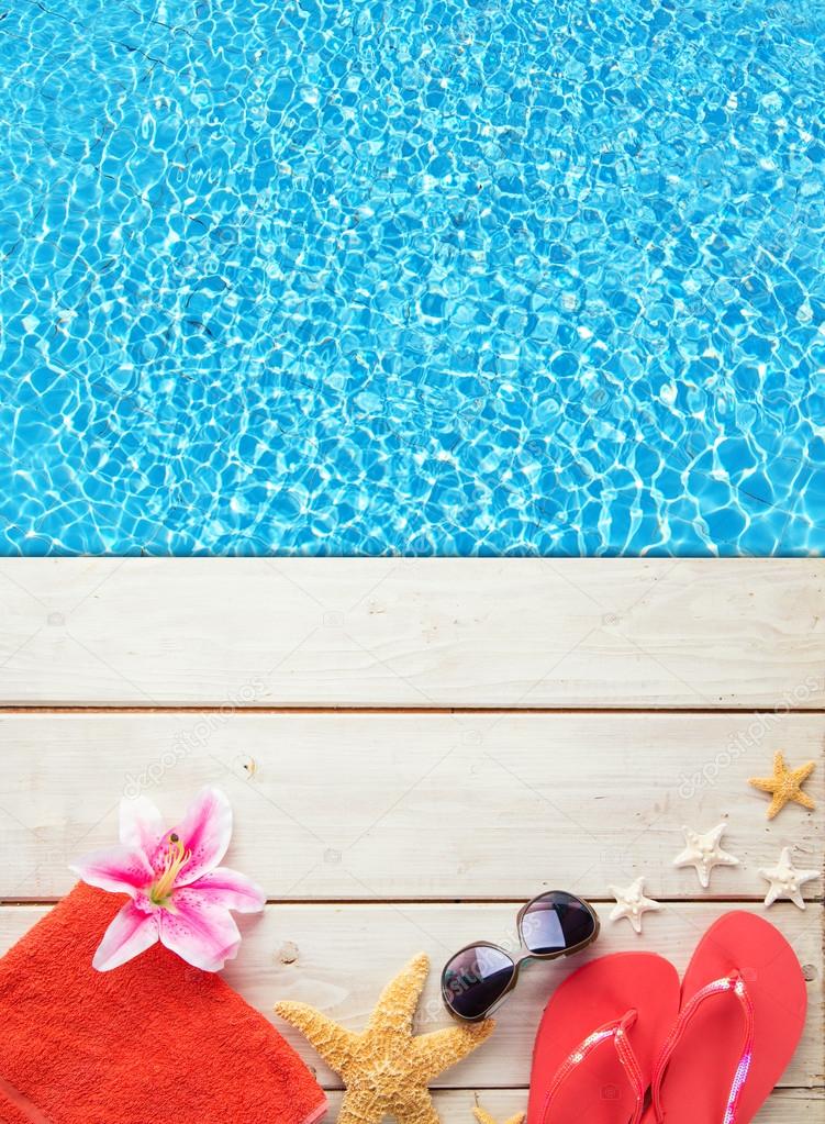 Beach Accessories On Wooden Background With Pool Stock Photo