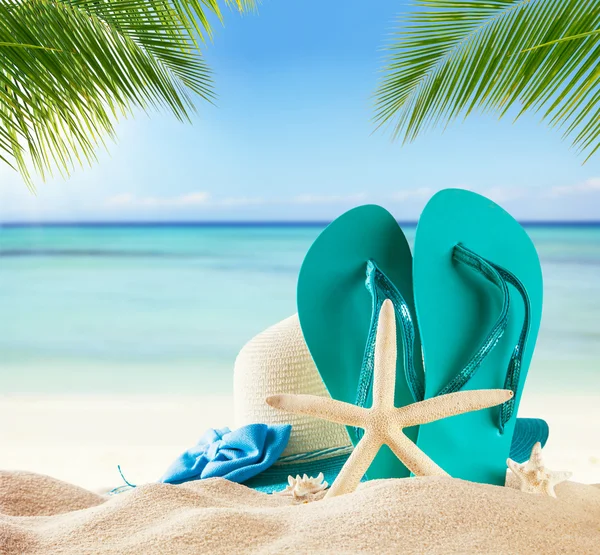 Summer beach accessories on sand — Stock Photo, Image