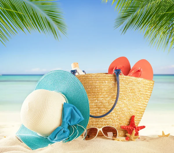 Summer beach accessories on sand — Stock Photo, Image