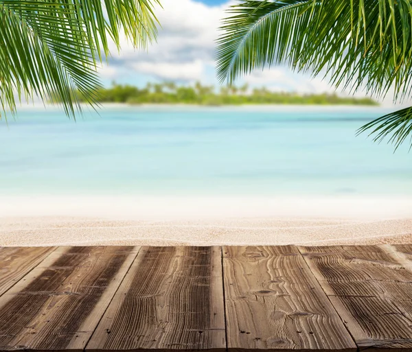 Empty wooden planks with blur beach on background — Stock Photo, Image