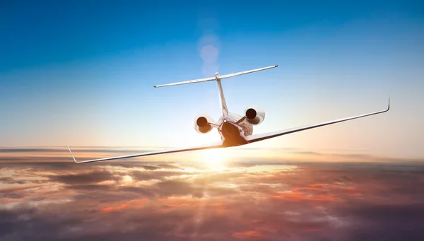 Private jet plane flying above clouds — Stock Photo, Image