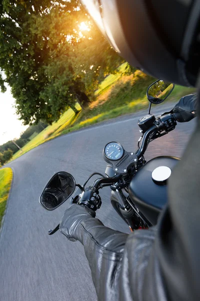 Motorcycle driver riding on motorway — Stock Photo, Image