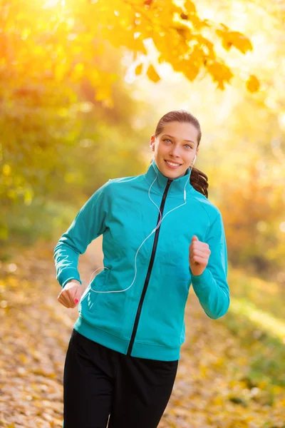 Young woman portrait, running in morning sun — Stock Photo, Image