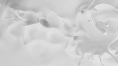 Makro çekimde süt çok yavaş sıçrıyor. Yüksek hızlı sinema kamerası, 1000fps.