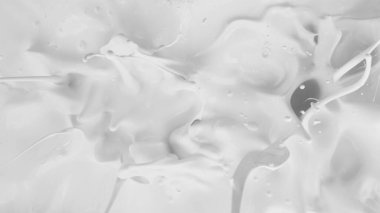 top angle of splashing milk texture, freeze motion, studio shit